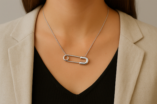 Close-Up of Safety Pin Necklace on Woman